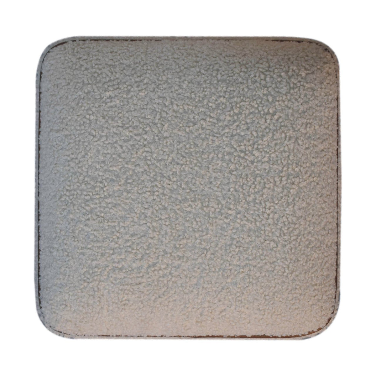 Boucle Footstool with Ball Feet styled beside an armchair