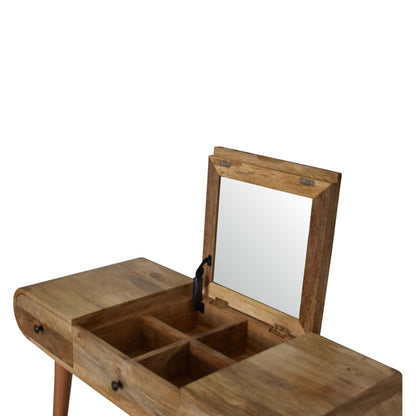 Detail view of the Round Dressing Table's solid mango wood grain