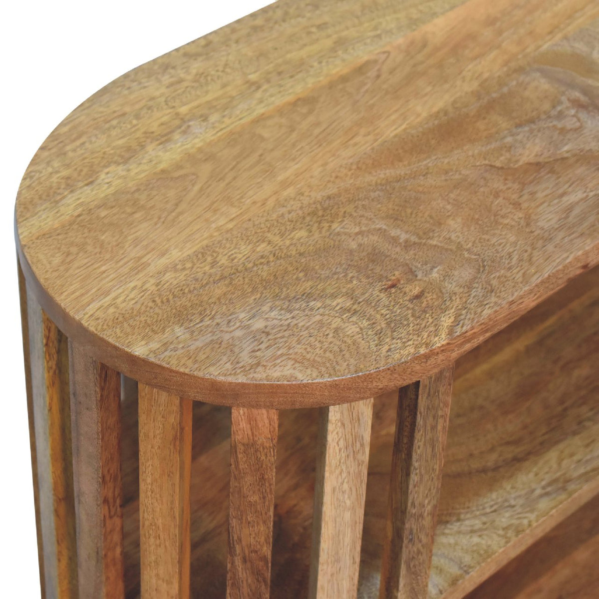 Detail view of the Open Fringed Shelf Table's solid mango wood grain