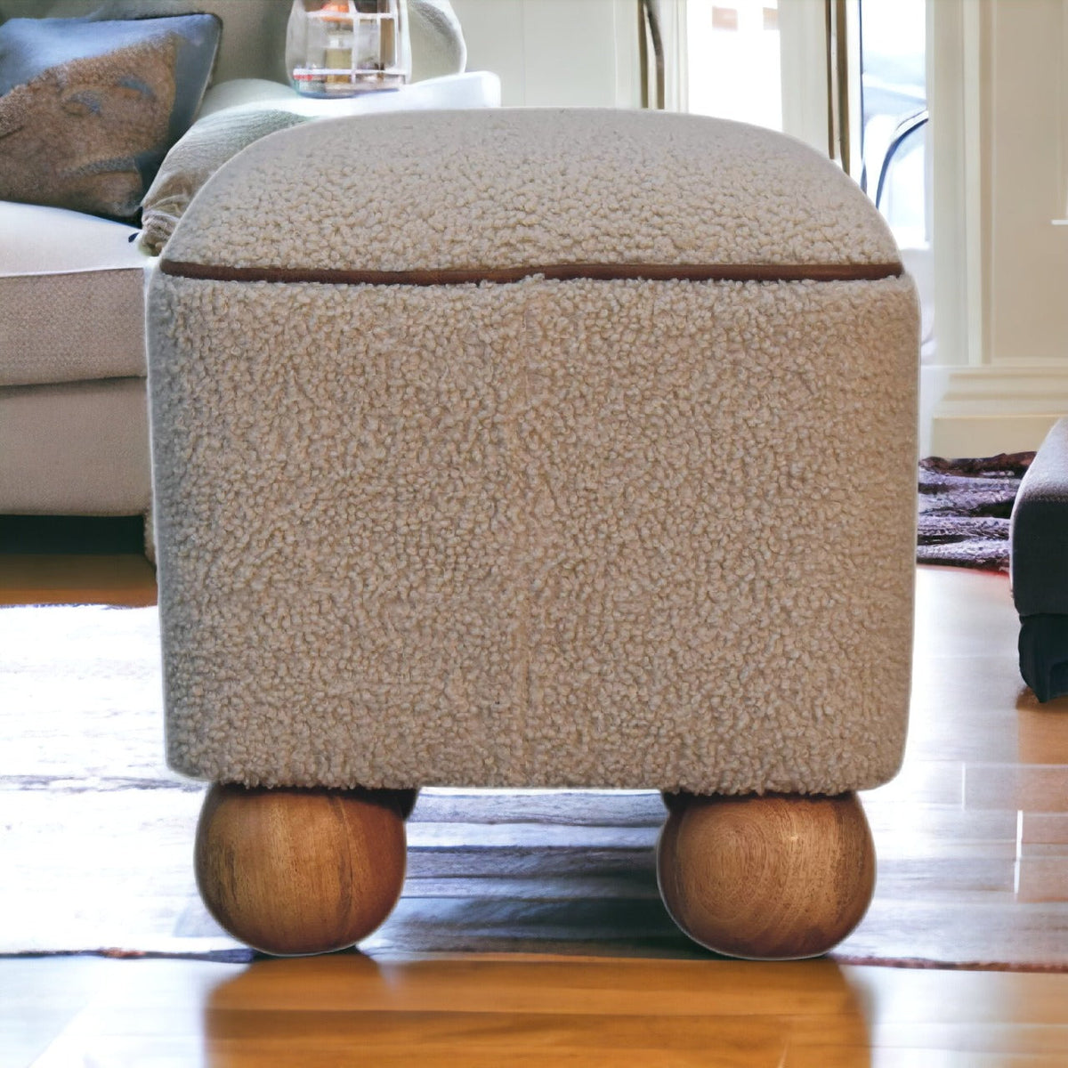 Boucle Footstool with Ball Feet, front view