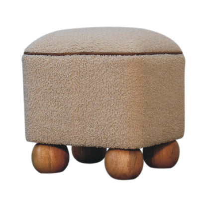 Boucle Footstool with Ball Feet, side profile showing oak-ish wood ball feet