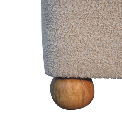 Boucle Footstool with Ball Feet, three-quarter angle view