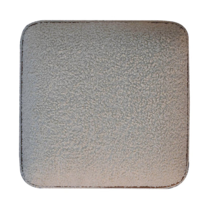 Boucle Footstool with Ball Feet styled beside an armchair