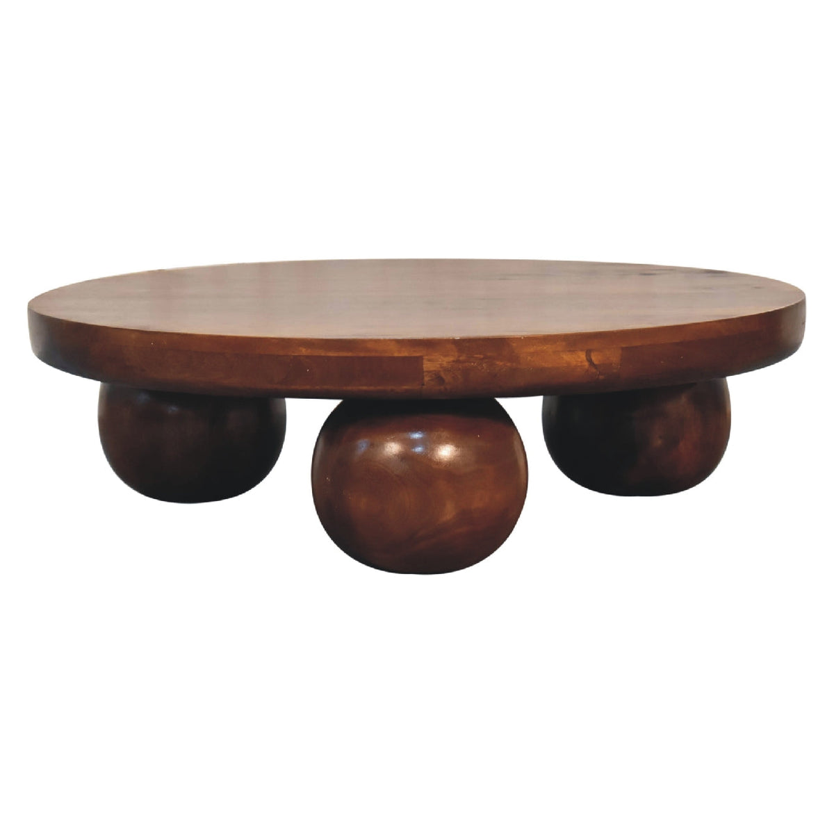Chestnut Ball Coffee Table styled in a living room setting