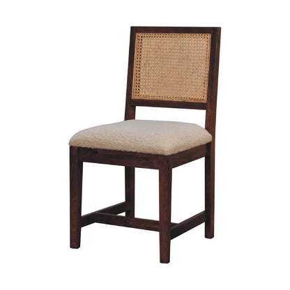 Close-up of the Cream Boucle Rattan Chair's woven rattan back