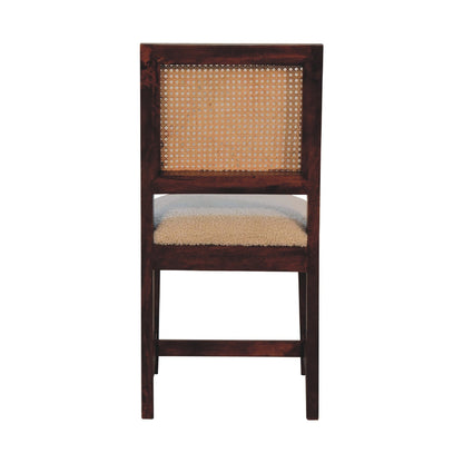 Cream Boucle Rattan Chair styled at a dining or accent setting