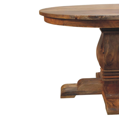 The Sculpted Pedestal Dining Table