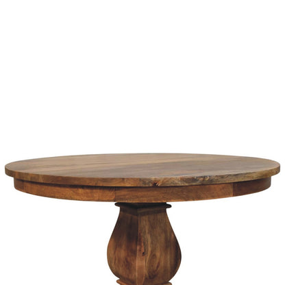 The Sculpted Pedestal Dining Table