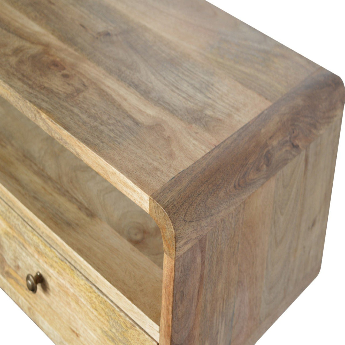 Detail view of the Curved Wood Console Table's solid mango wood grain